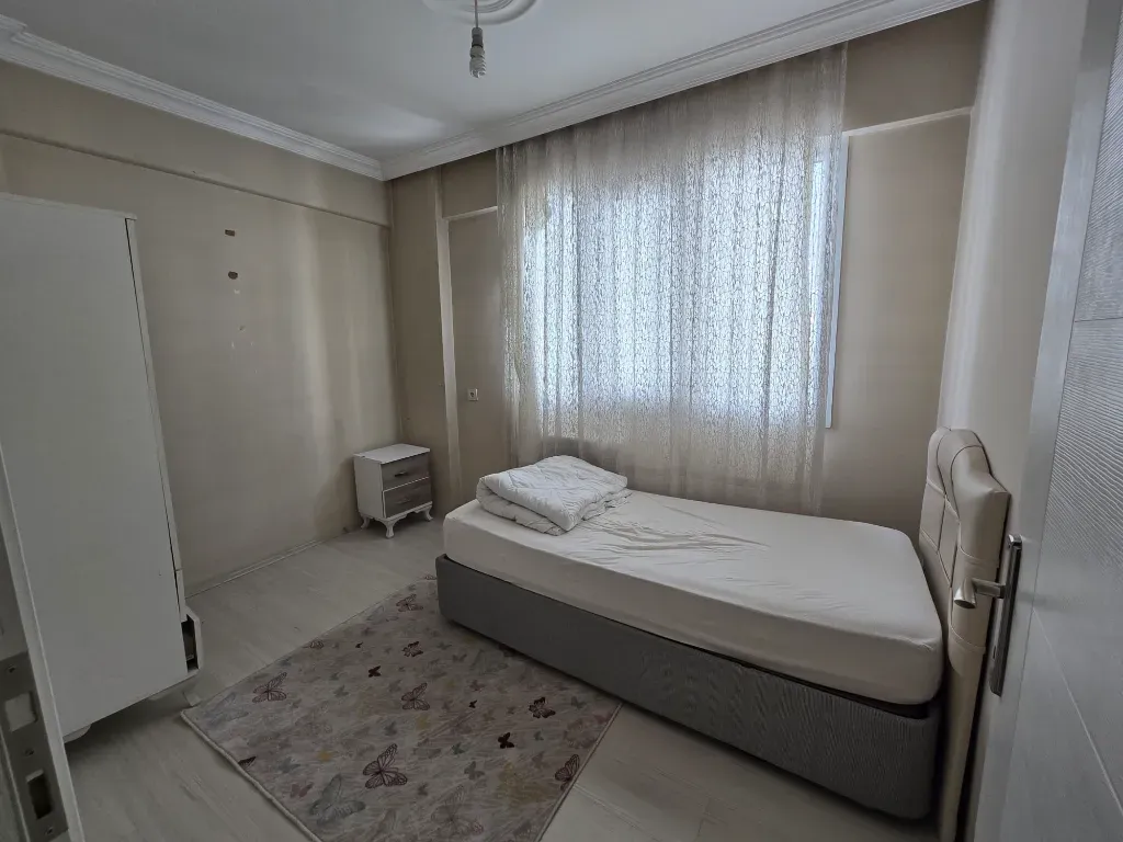 BULUNUR EMLAKTAN ORTA MAHALLEDE EŞYALI KİRALIK 2+1 ARA KAT DAİRE